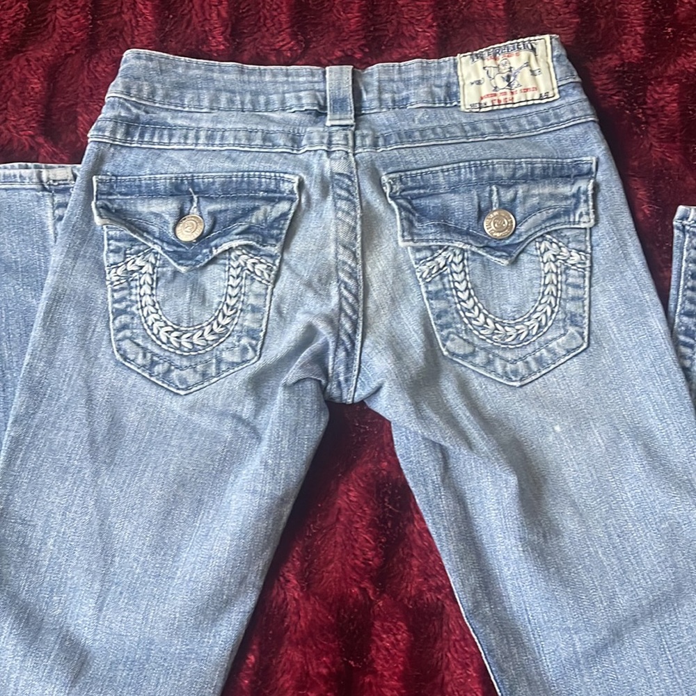 light wash true religion straight jeans size 24 with minor imperfection/ in pics